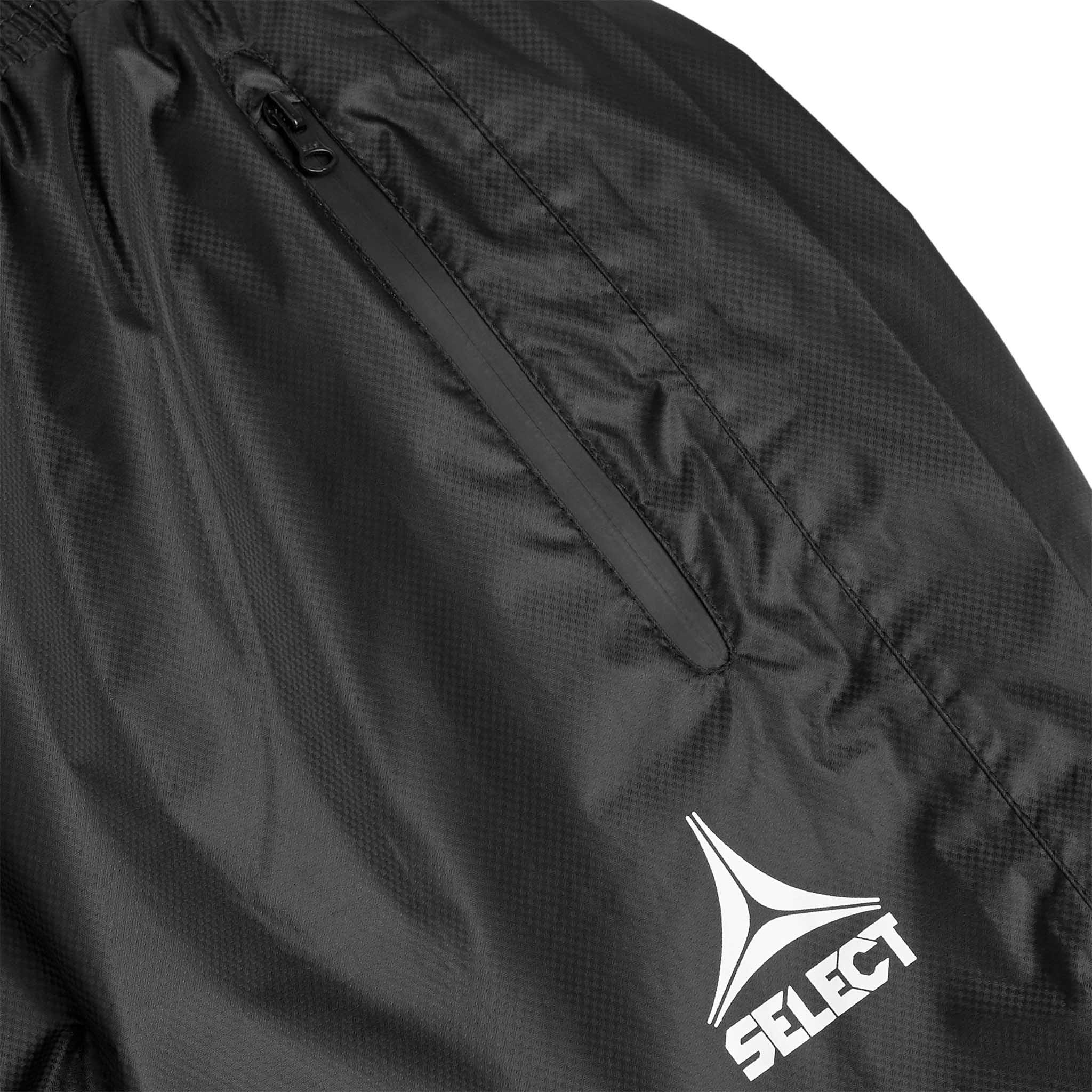 Closeup of black All-weather pants Monaco v24, showing zip pocket and Select logo. Match & Training football wear.