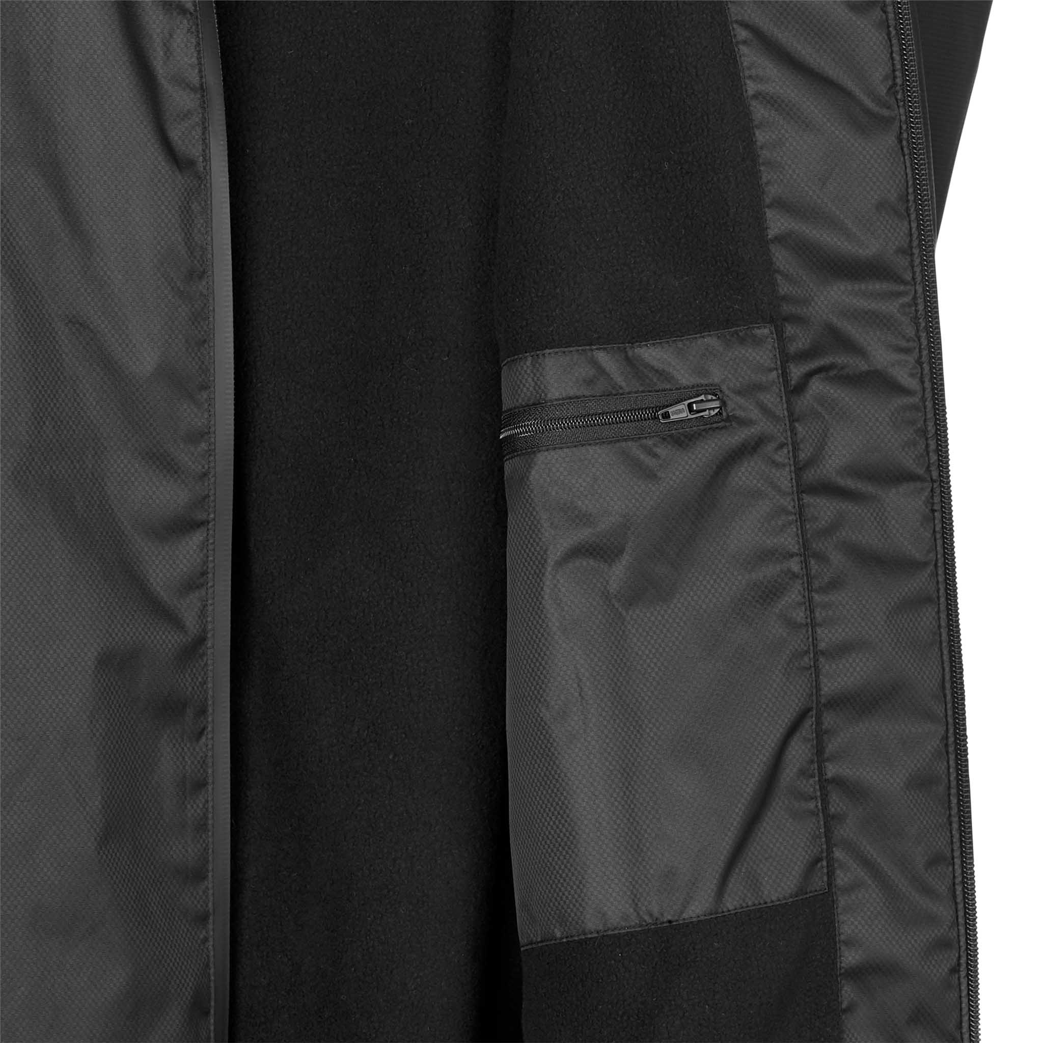 Closeup of black Functional jacket Monaco v24, Match & Training wear, showing inner zip pocket and fleece lining.