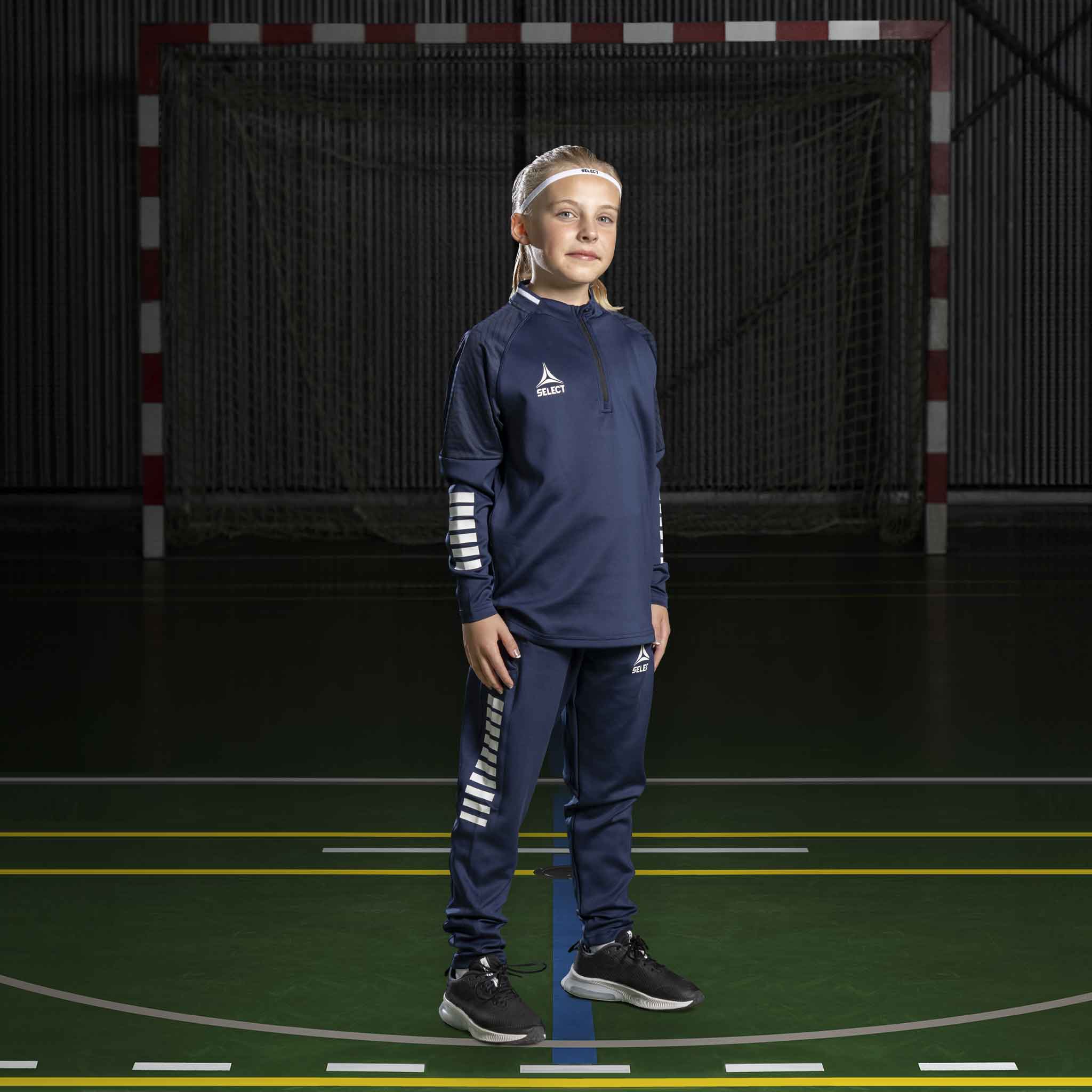 Boy handball player in navy and white Training sweat 1/2 zip Monaco v24, Match & Training wear, on court.