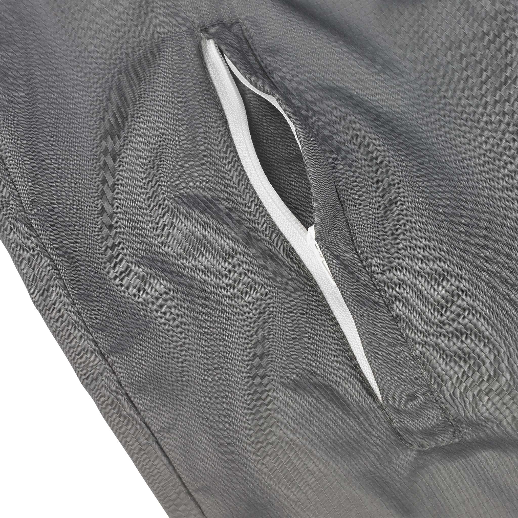 Closeup of grey Training jacket Spain v25 pocket zip with white lining, Match & Training wear