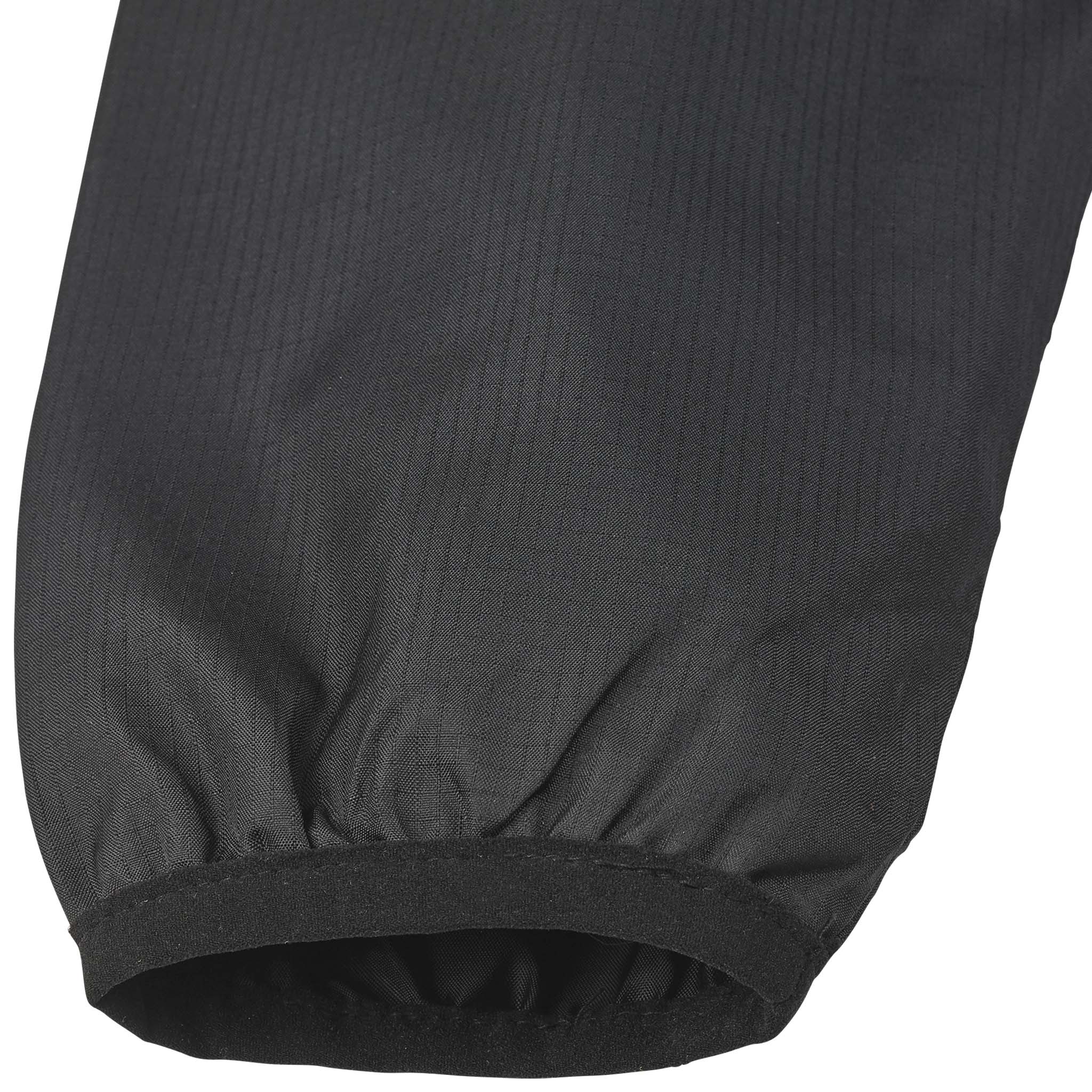 Closeup of black Windbreaker Spain v25 sleeve cuff, Match & Training wear, ribbed elastic football detail