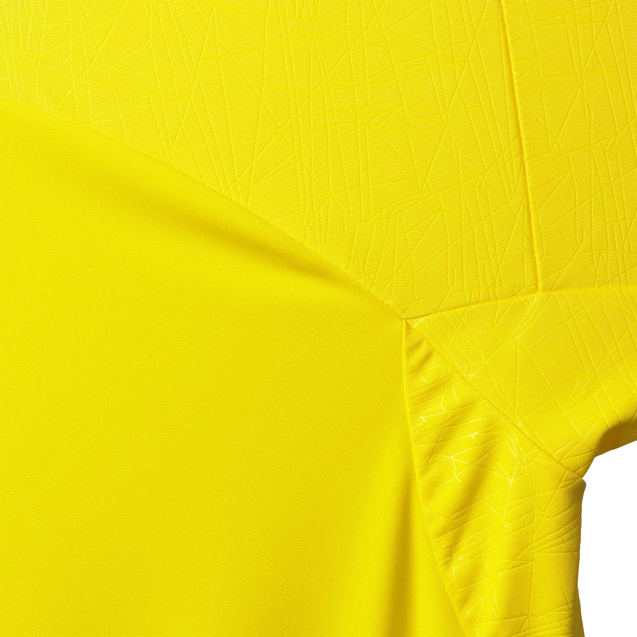 Closeup of yellow Player shirt S/S Spain v25, Match & Training wear, showing fabric texture and seam detail