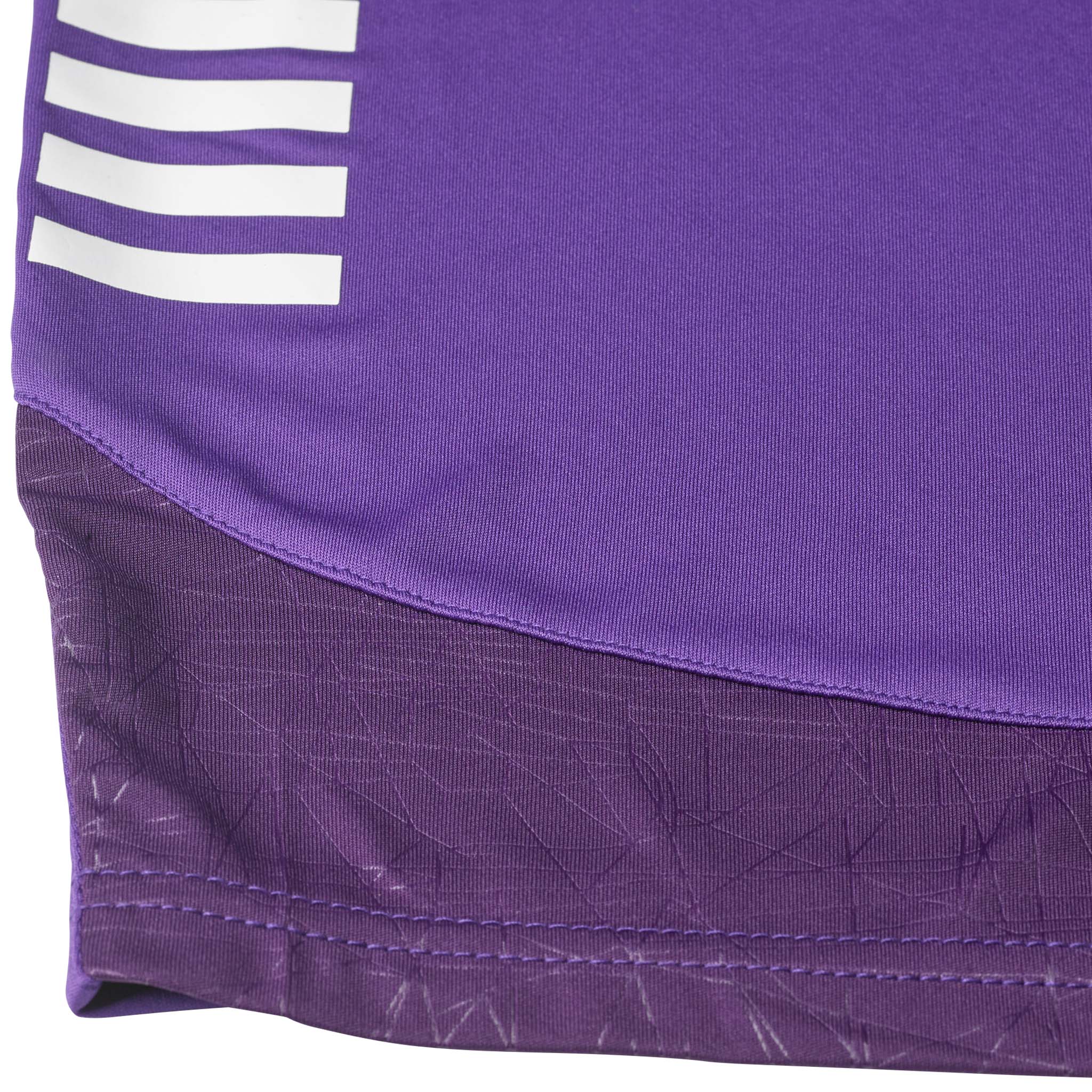 Closeup of purple Player shorts Spain v25, Match & Training wear, white stripes and patterned hem detail