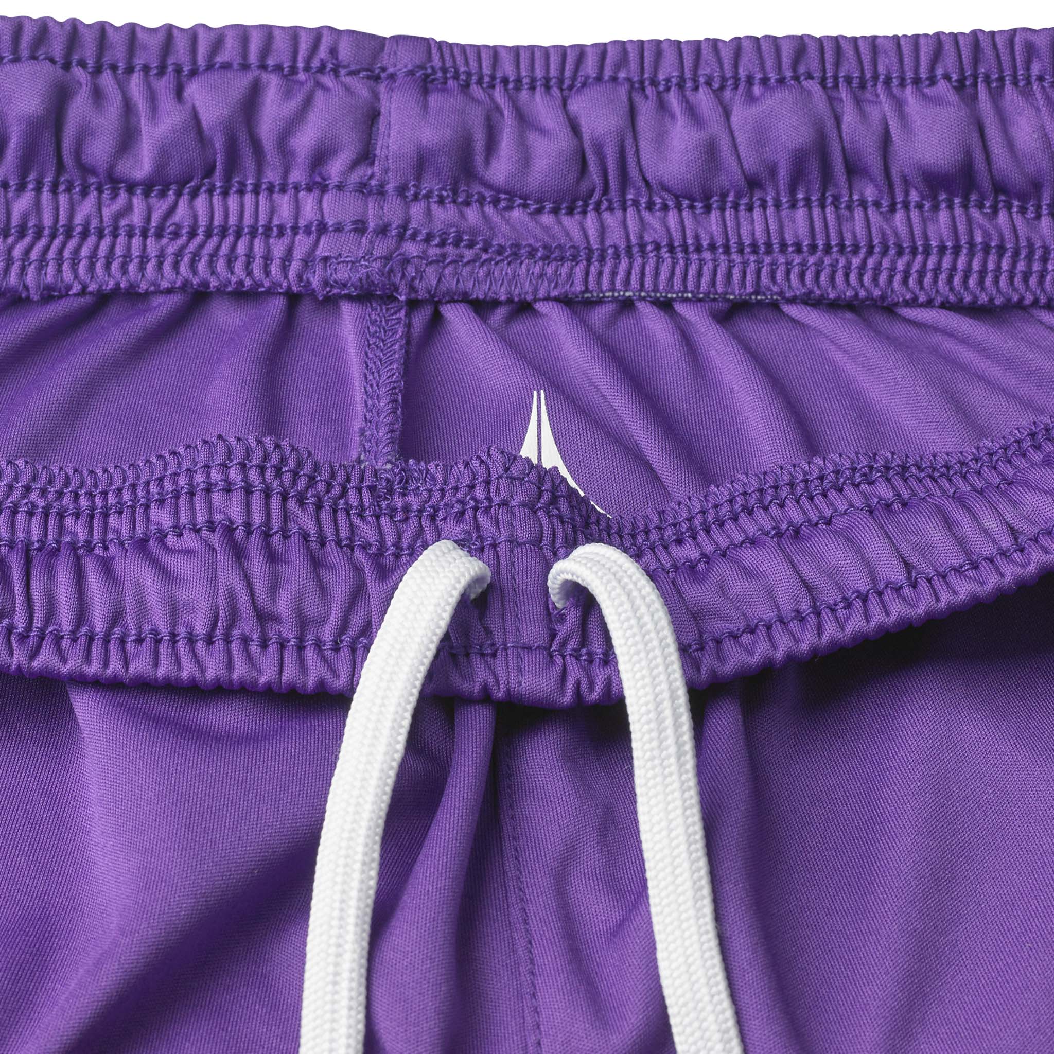 Closeup of purple Player shorts Spain v25, Match & Training wear, with elastic waistband and white drawstring.