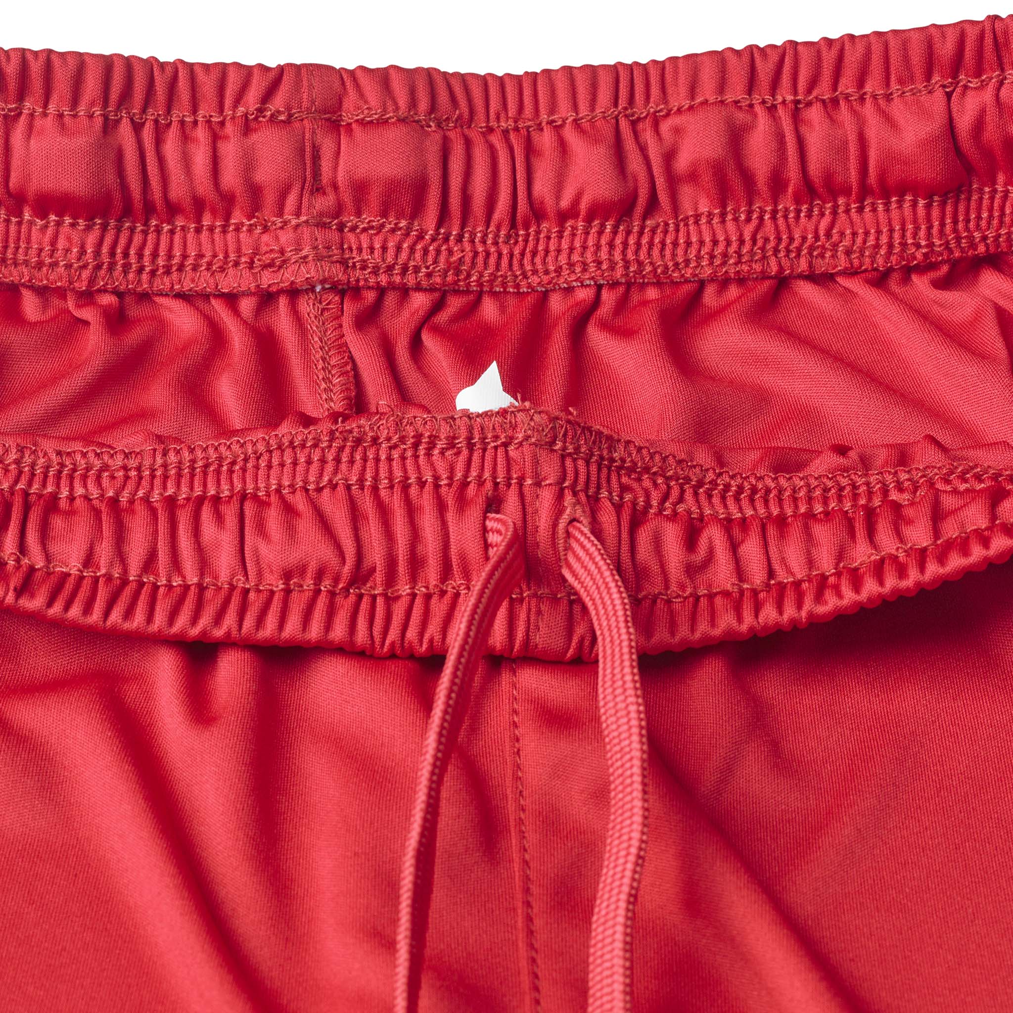Closeup of red Player shorts Spain v25, Match & Training wear, showing elastic waistband and drawstring detail
