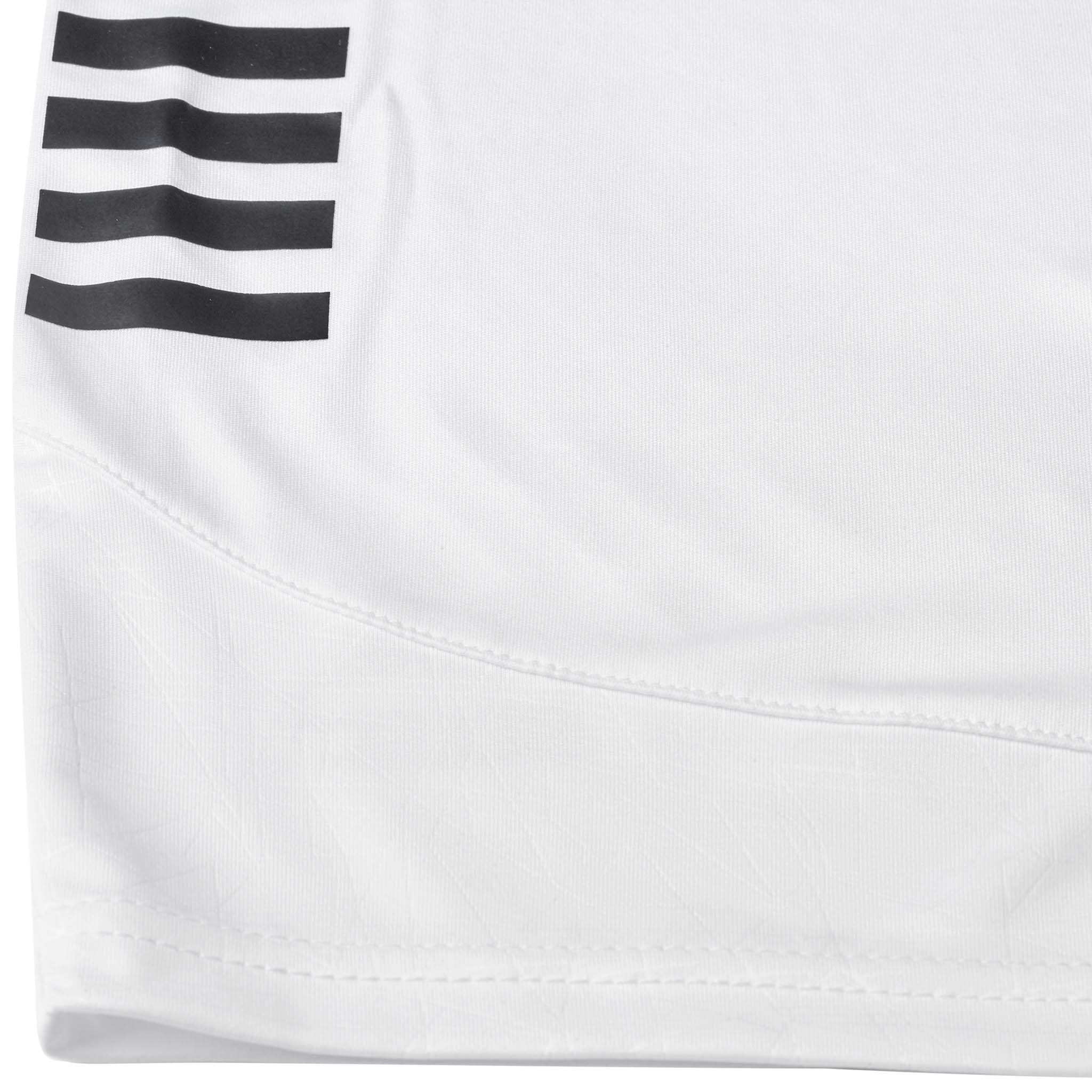 Closeup of white Player shorts Spain v25, Match & Training wear, with black stripe detail and hem.