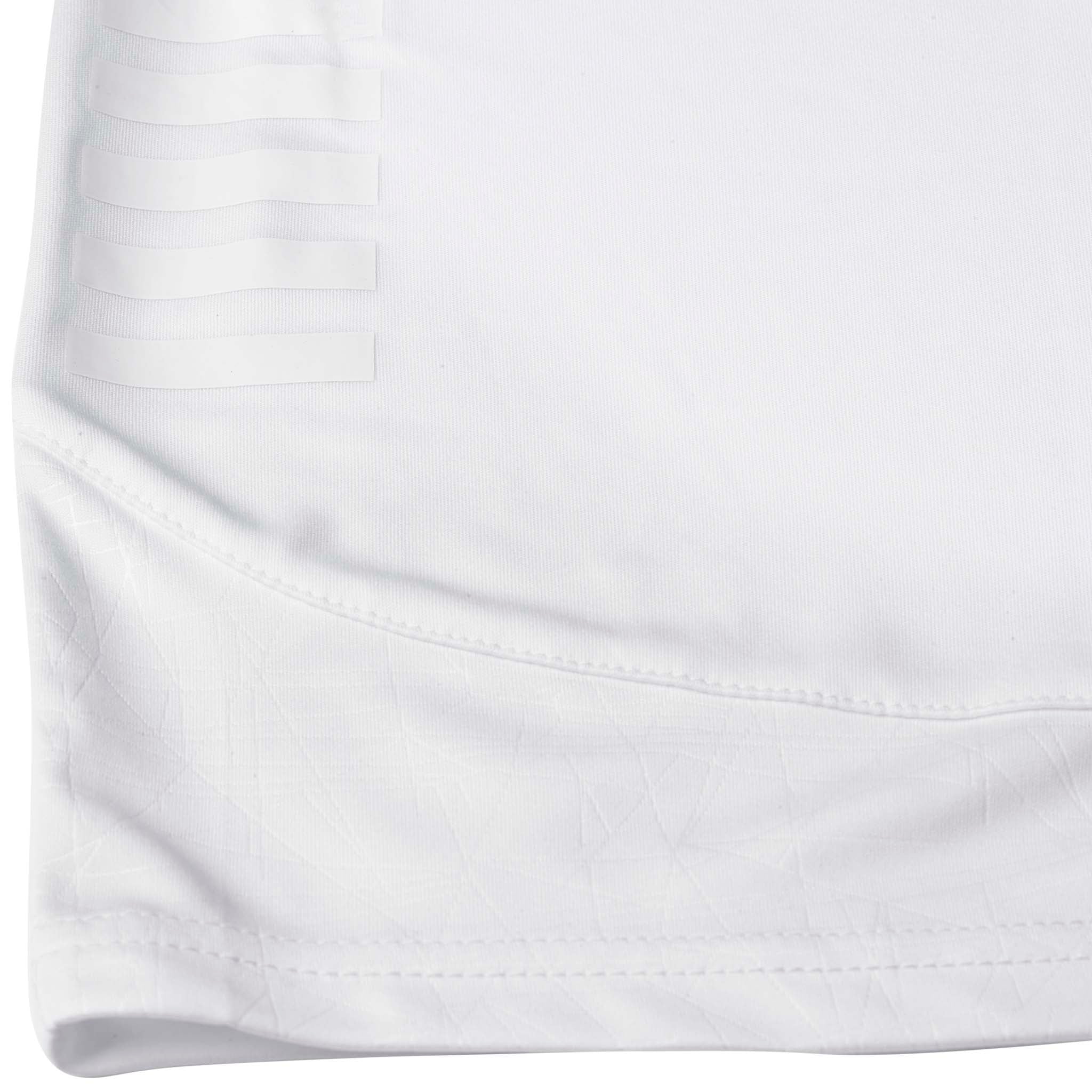 Closeup of white Player shorts Spain v25, Match & Training wear, showing fabric texture and stitched hem detail.