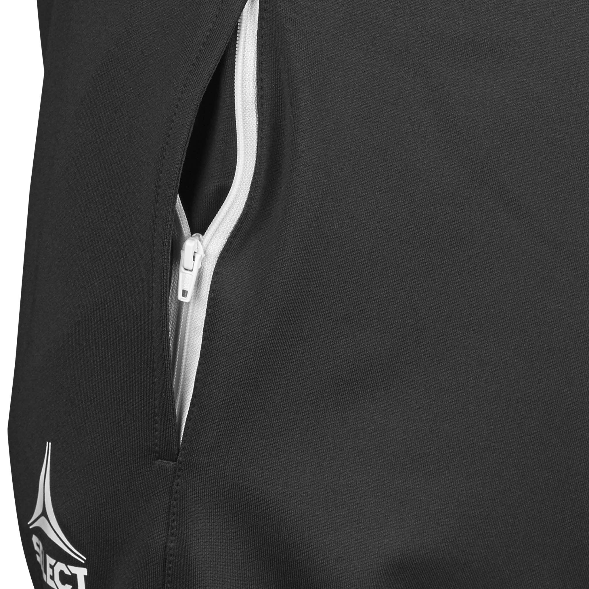 Closeup of black Training pants regularFit Spain v25, Match & Training wear, white zip pocket and logo.