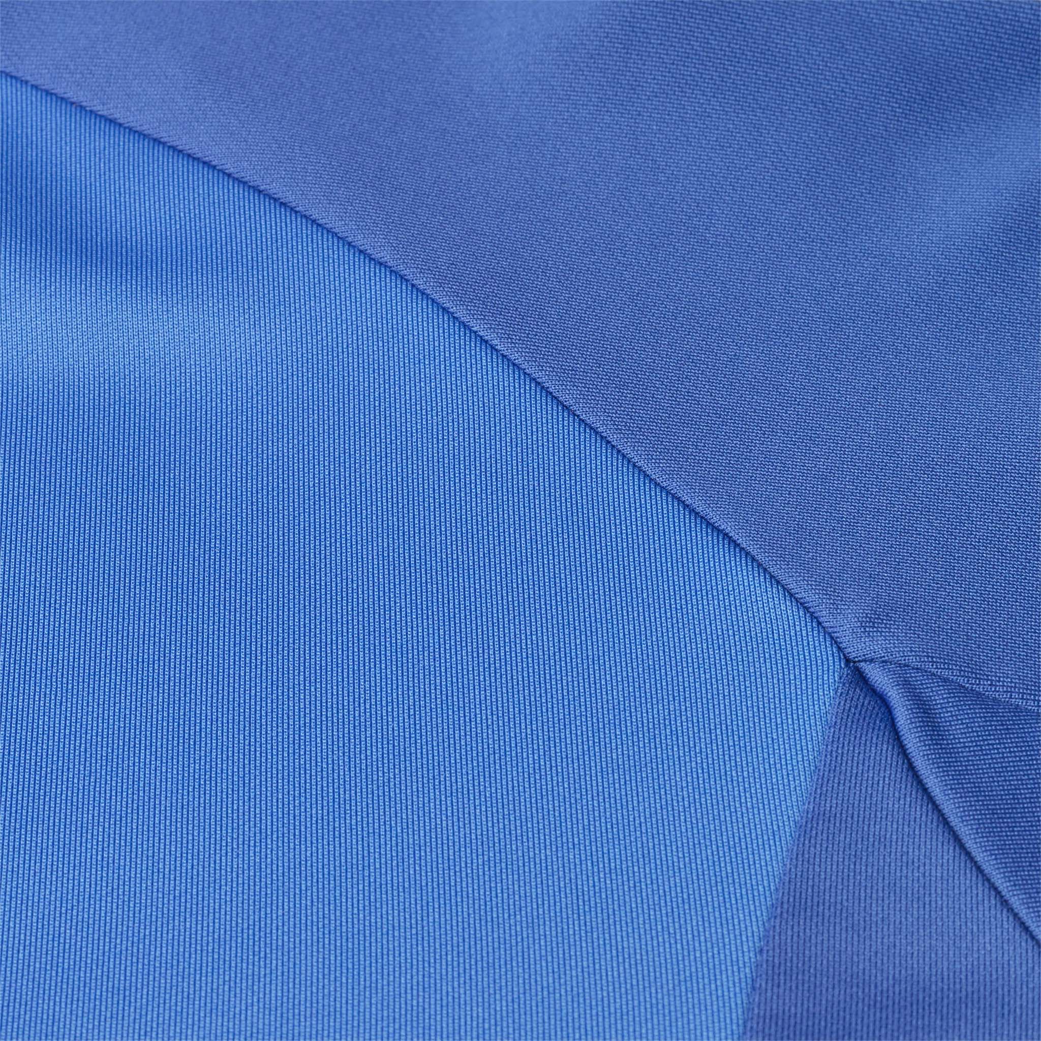 Closeup of blue fabric panels on Training zip jacket Spain v25, Match & Training football wear