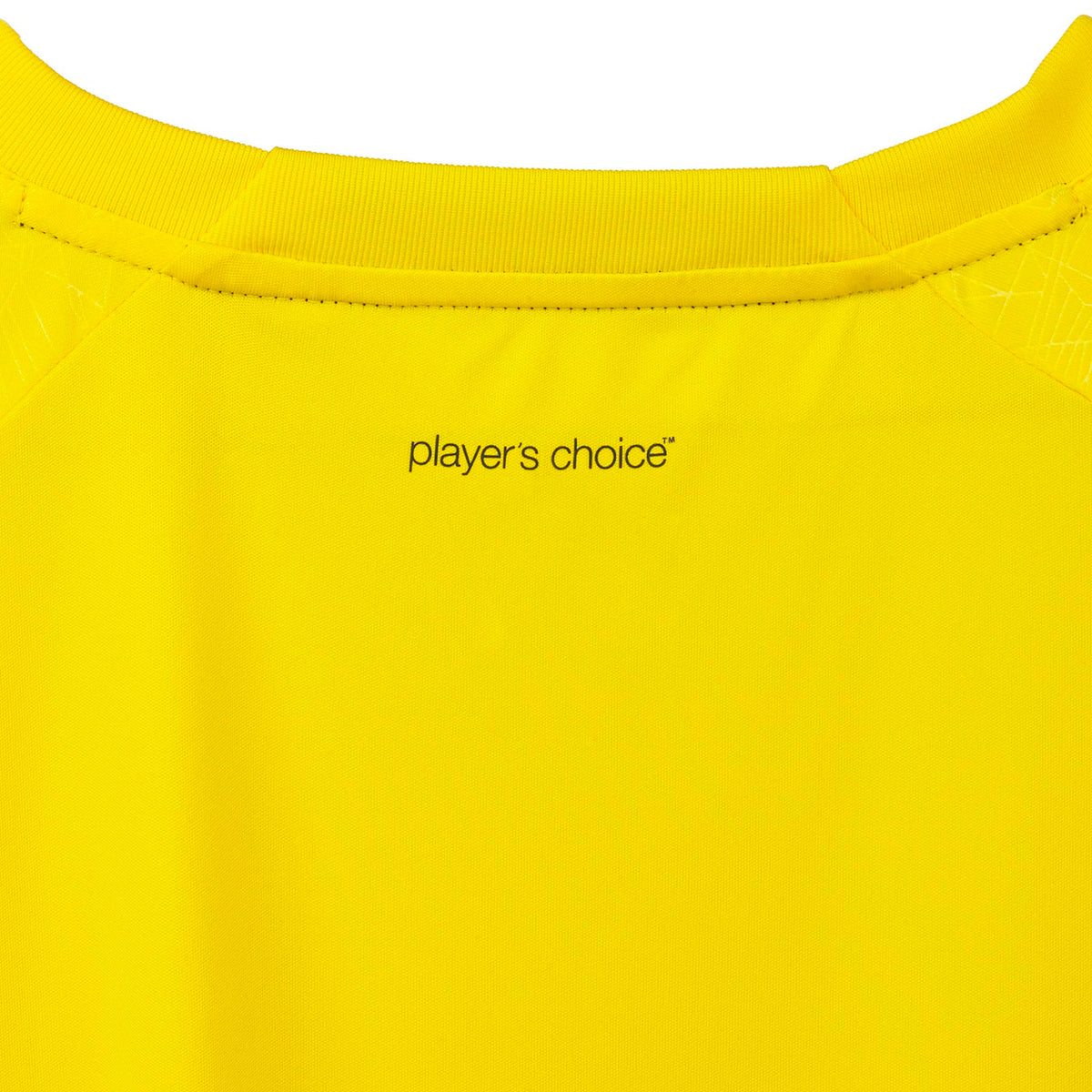 Closeup of yellow Player shirt S/S Spain woman v25, Match & Training wear, showing 'player's choice' print and neckline.