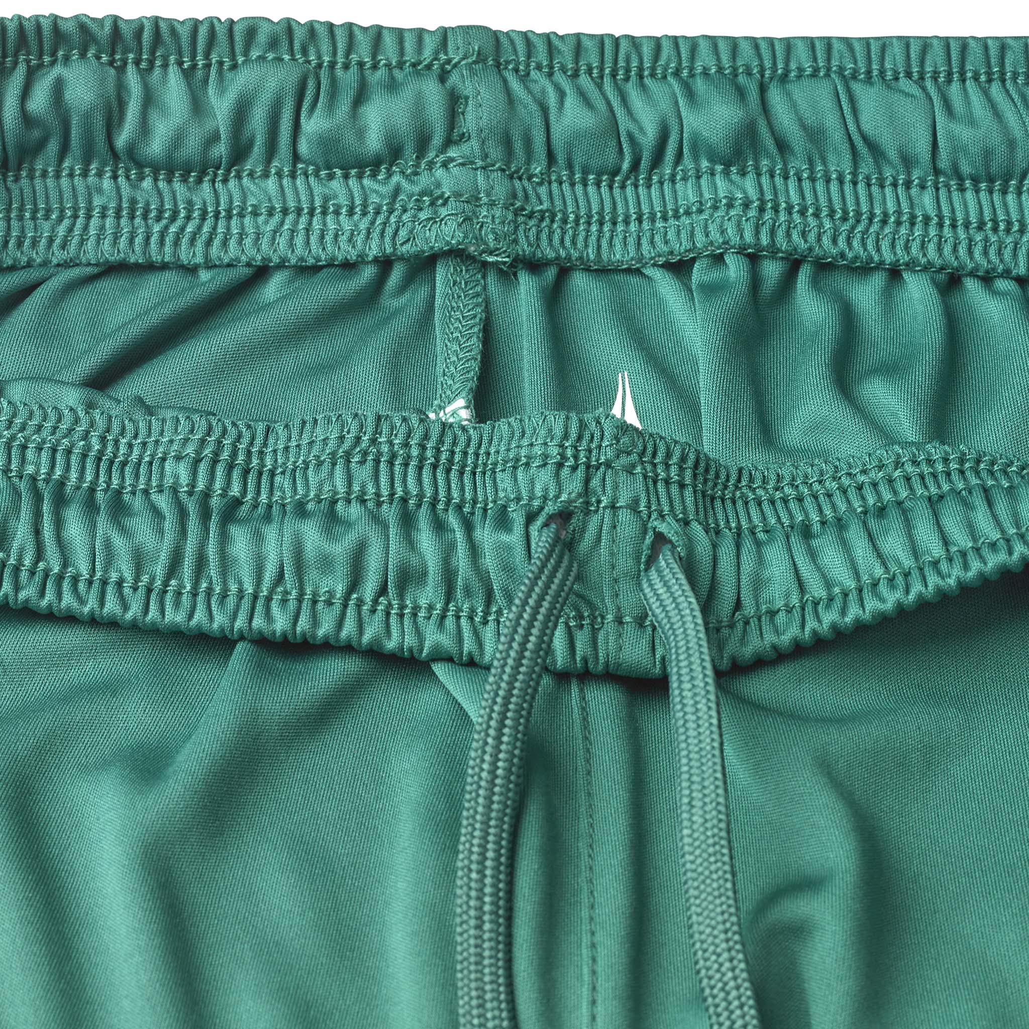 Closeup of green Player shorts Spain woman v25, football Match & Training wear, elastic waistband with white drawstring