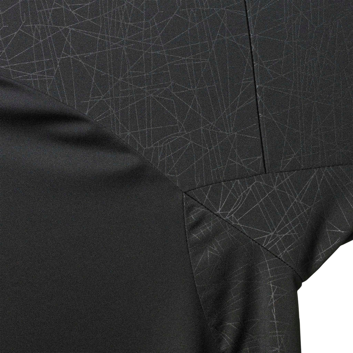 Closeup of Player shirt S/S Spain woman v25, Match & Training wear, black fabric with grey geometric line pattern