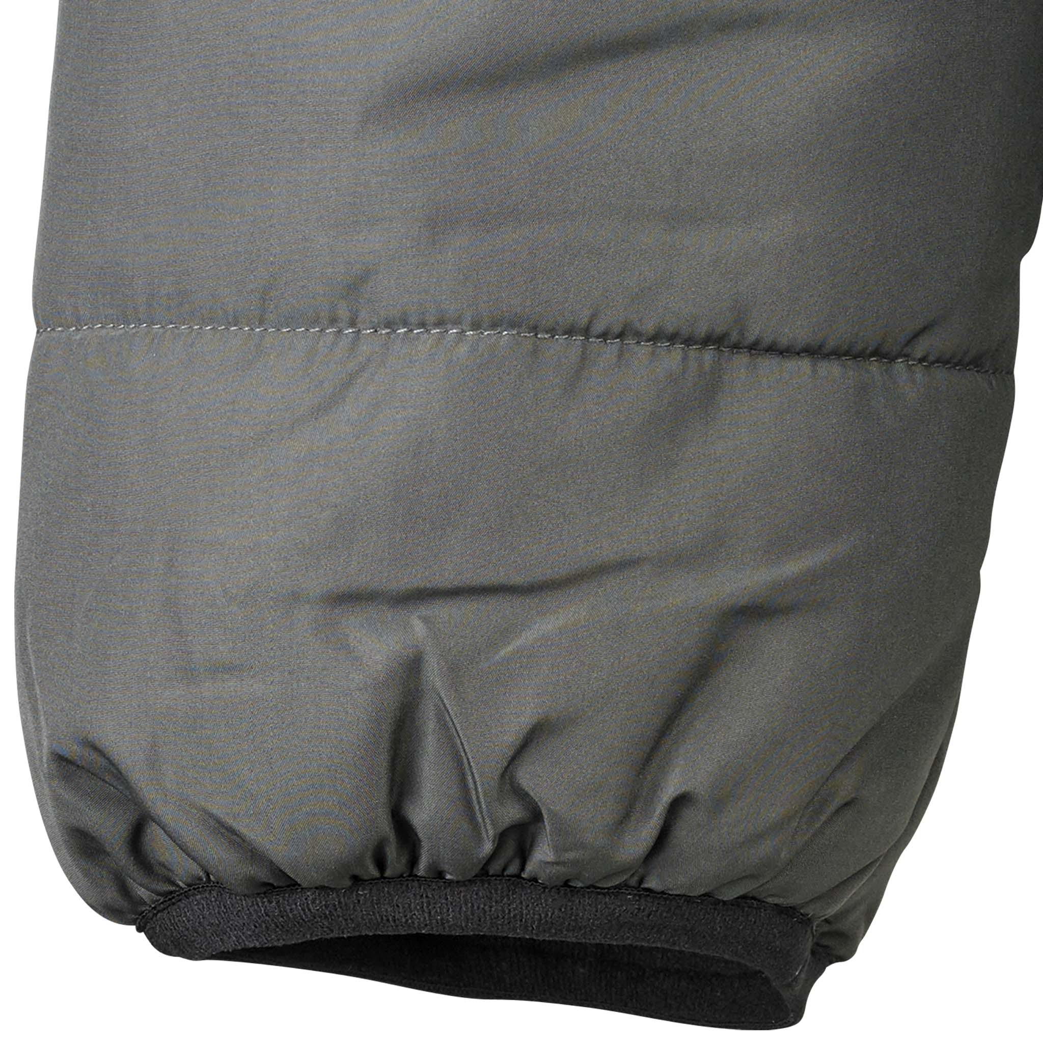 Closeup of grey Padded jacket Oxford v25 leisure wear, showing quilted sleeve and black ribbed cuff.