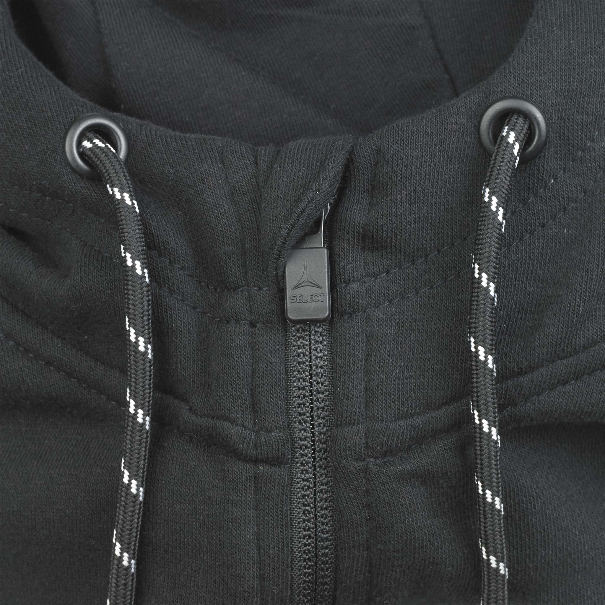 Closeup of black Zip hoodie Oxford v25 leisure wear, showing zipper pull and reflective drawstrings.