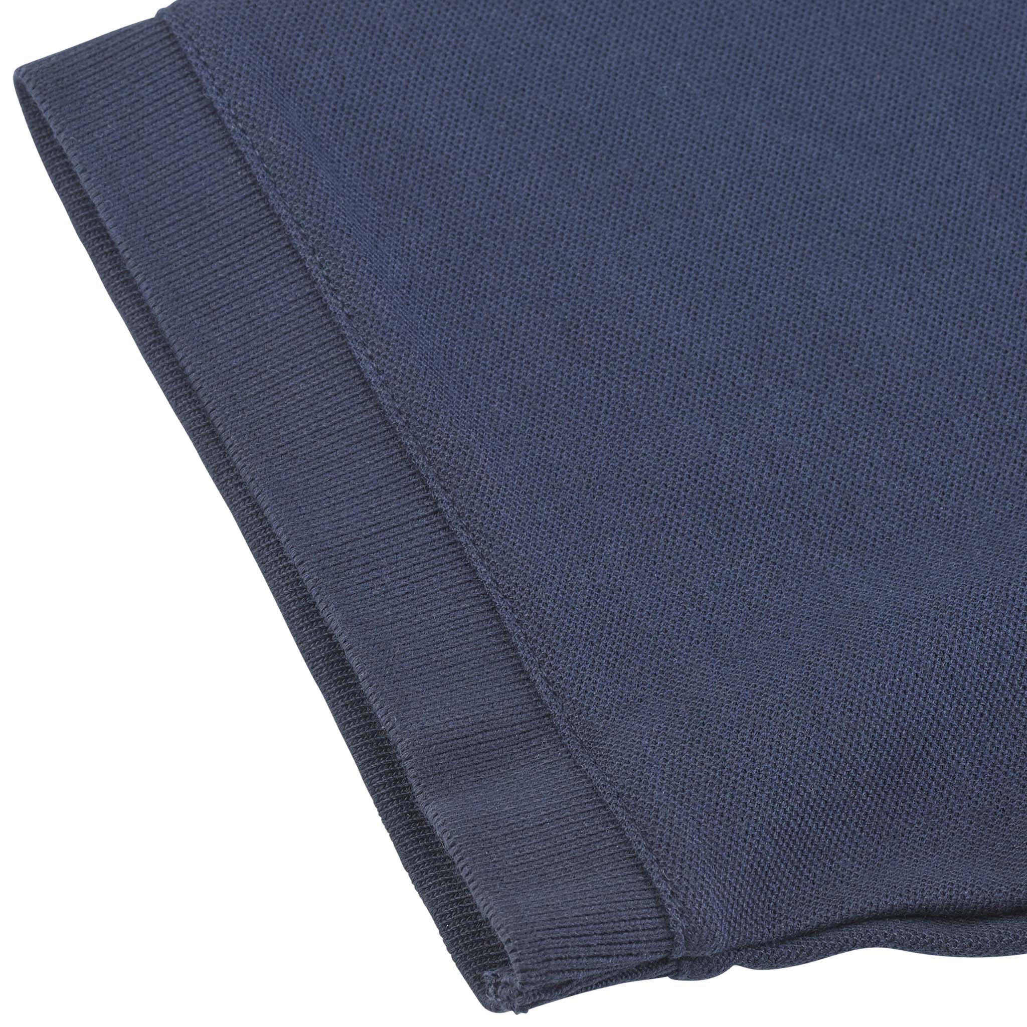 Closeup of navy Polo t-shirt Oxford v25 leisure wear, showing ribbed sleeve cuff and textured fabric.