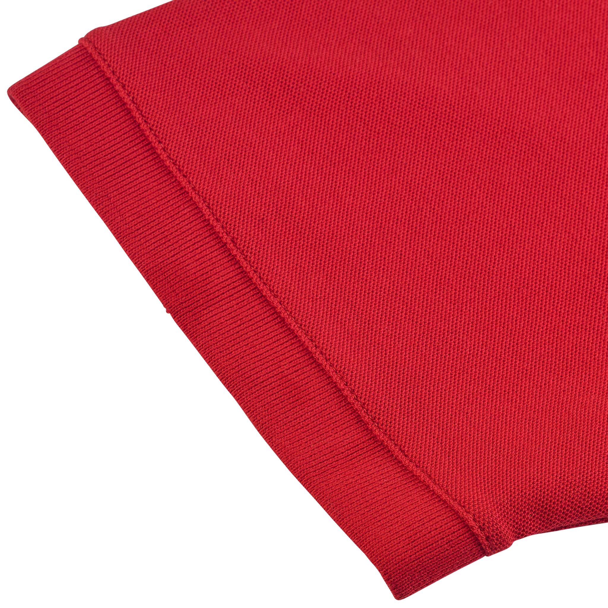 Closeup of red Polo t-shirt Oxford v25 leisure wear, showing ribbed collar and sleeve detail.