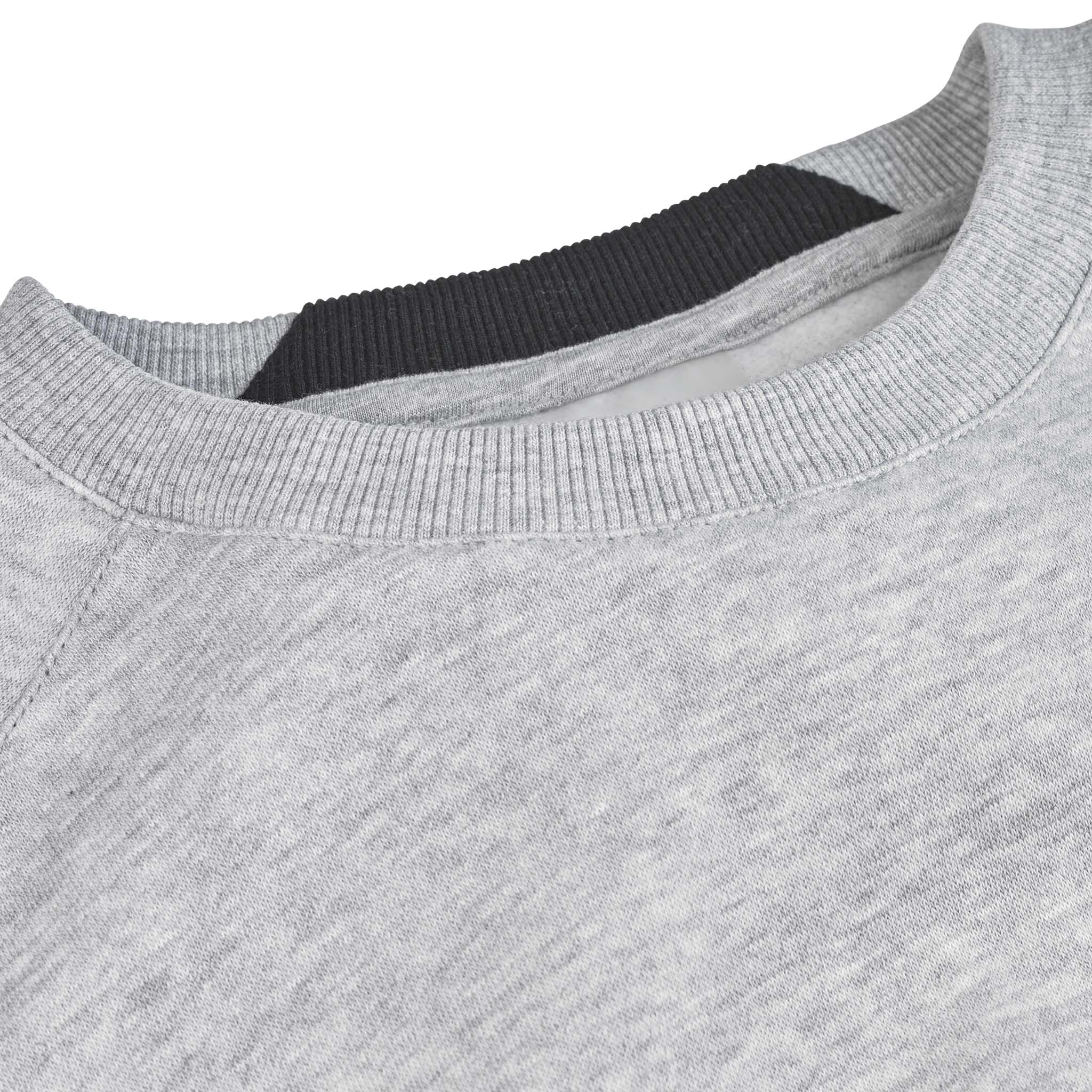 Closeup of grey Sweat Oxford v25 leisure wear, showing ribbed crew neck with navy inner trim.