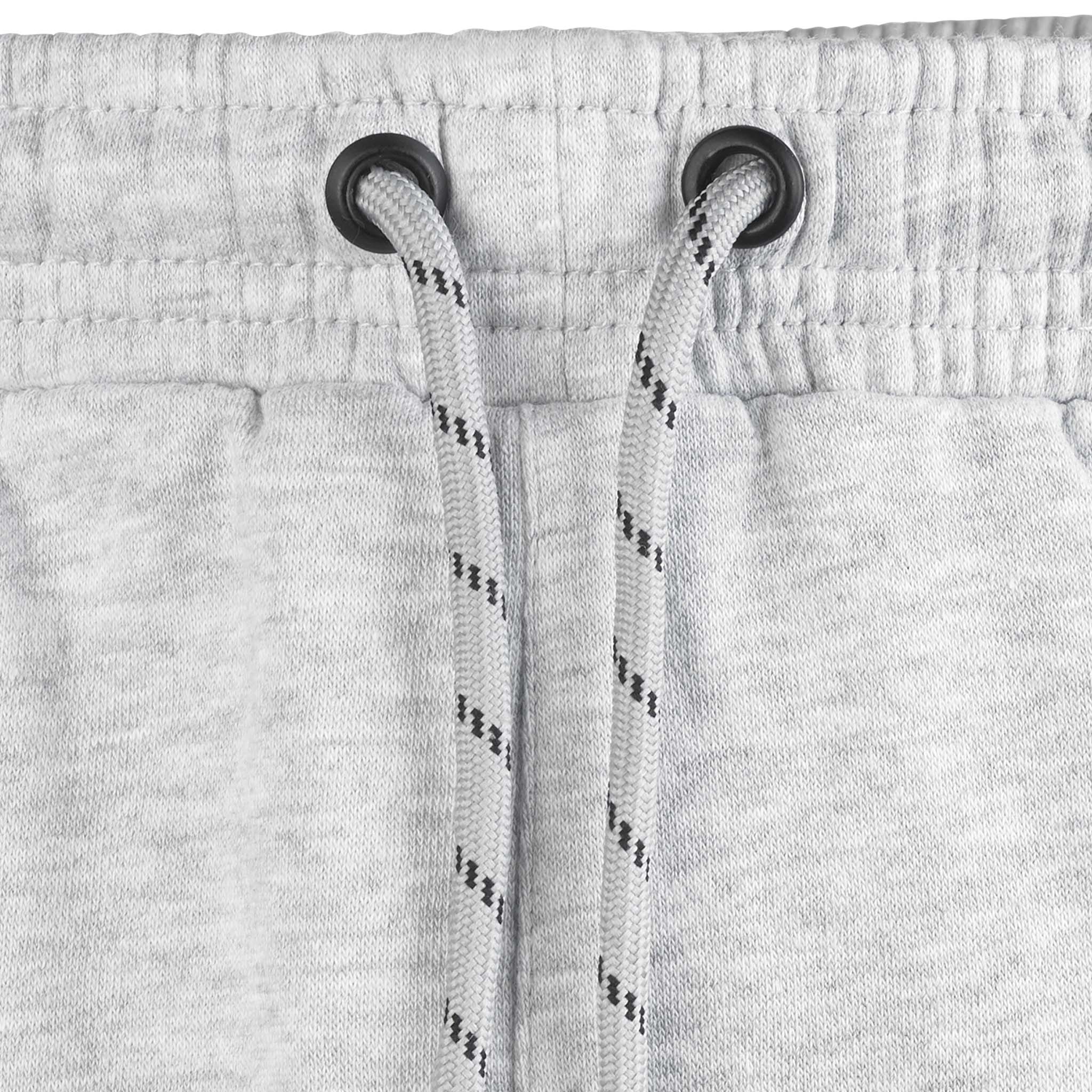 Closeup of grey Sweat pants Oxford v25 leisure wear, showing drawstring and eyelets at the waistband.