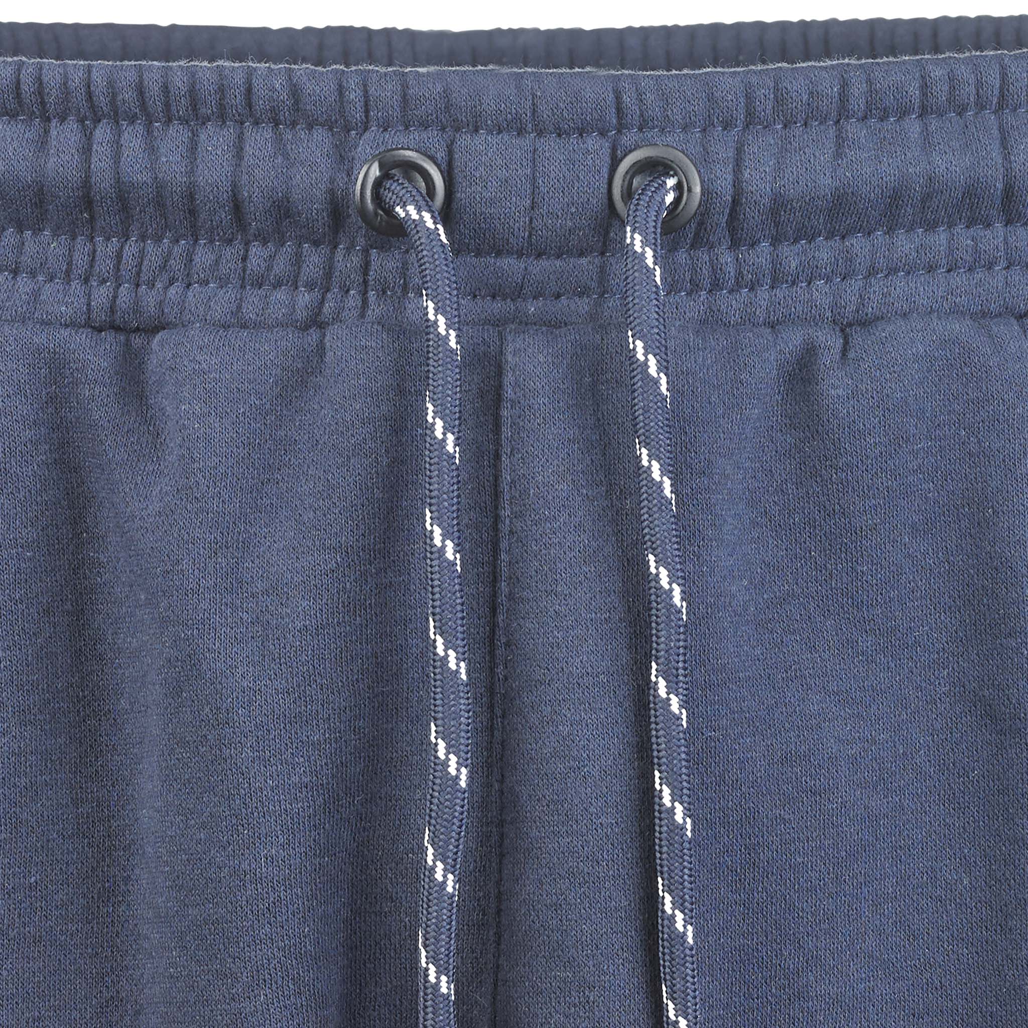 Closeup of navy Sweat pants Oxford v25 leisure wear, showing elastic waistband and blue-white drawstring.