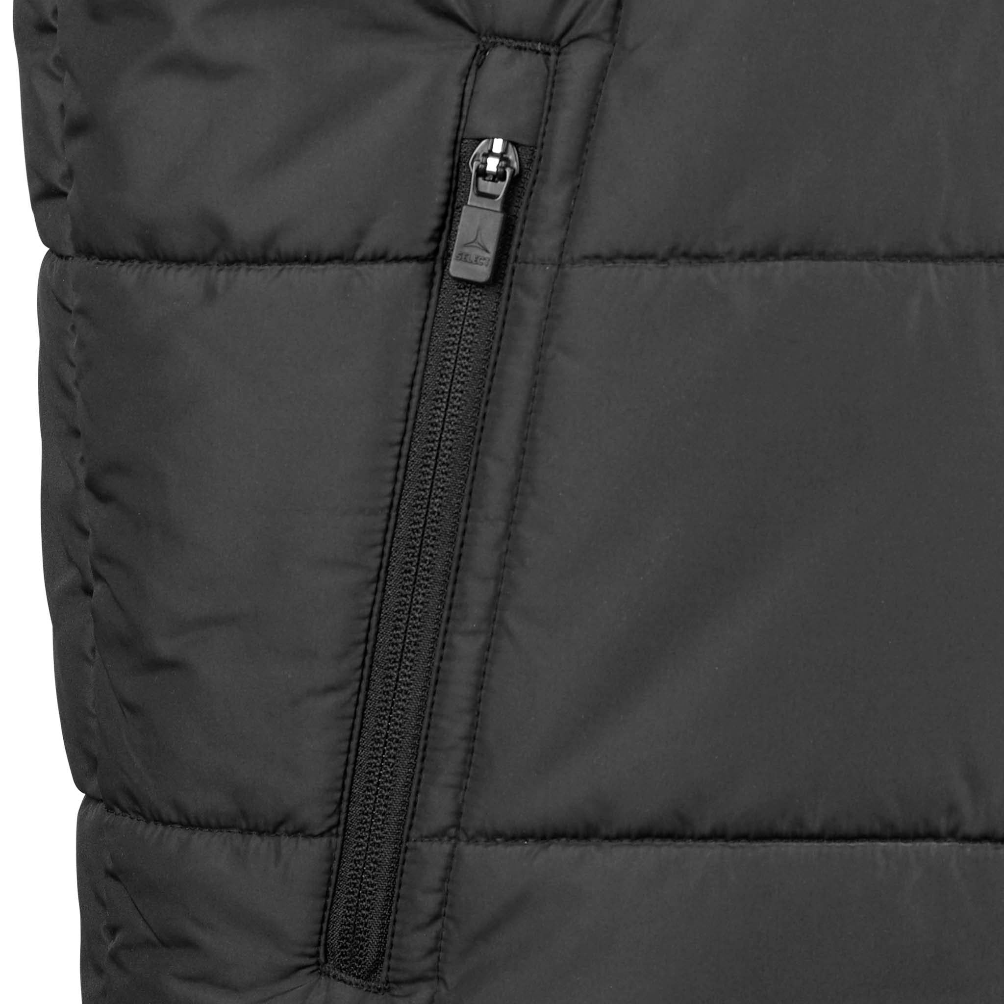 Closeup of black Padded vest Oxford v25, leisure wear, showing quilted fabric and zipper detail.
