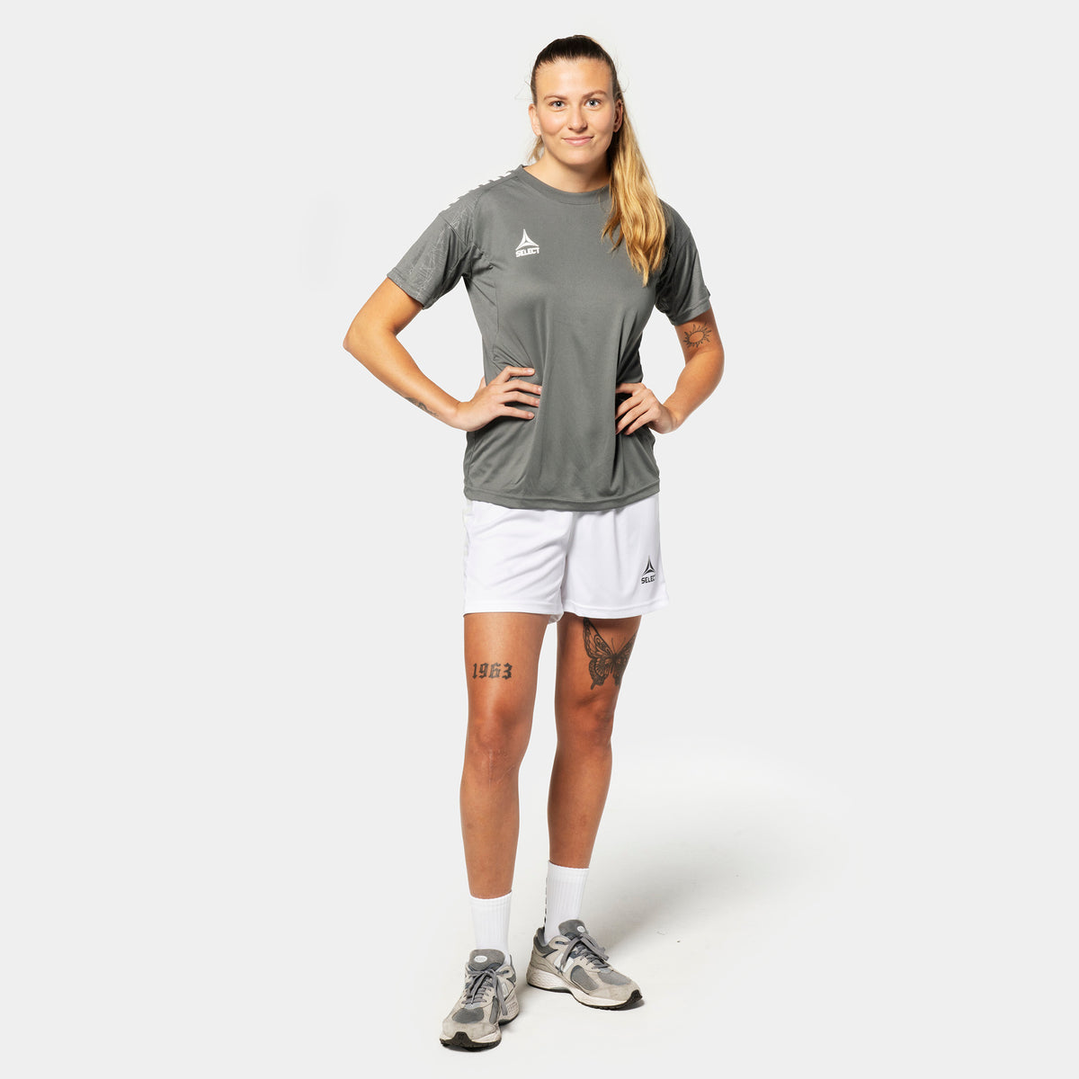 Woman football player in grey Player shirt S/S Spain woman v25 and white Player shorts Spain woman v25, Match & Training wear