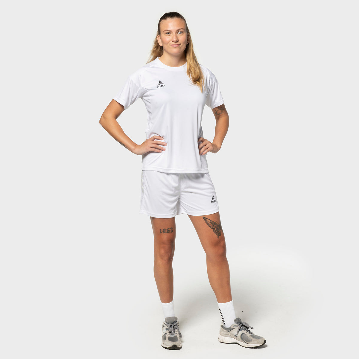 Woman football player in white Player shirt S/S Spain woman v25 and Player shorts Spain woman v25, Match & Training wear