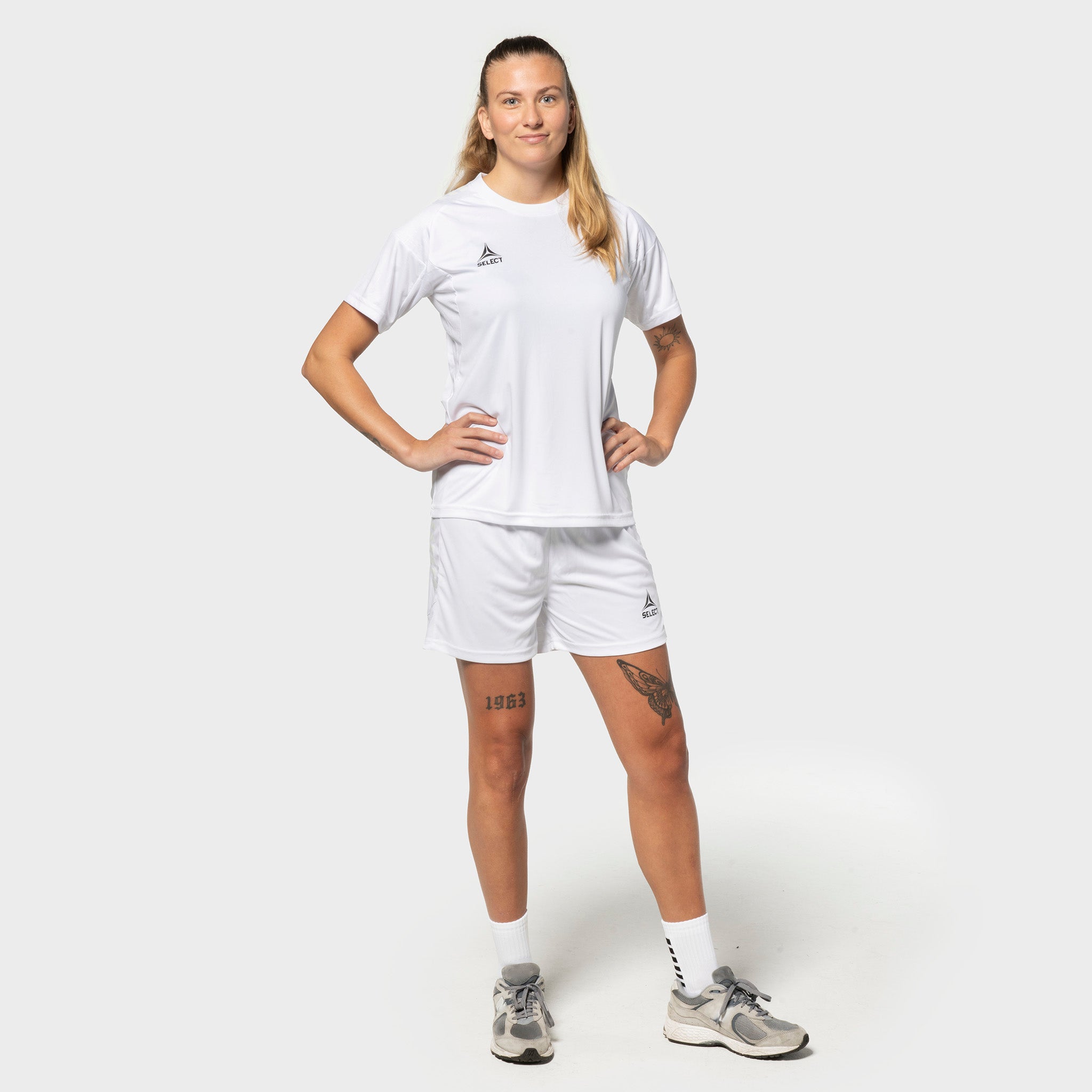 Woman football player in white Player shirt S/S Spain woman v25 and Player shorts Spain woman v25, Match & Training wear