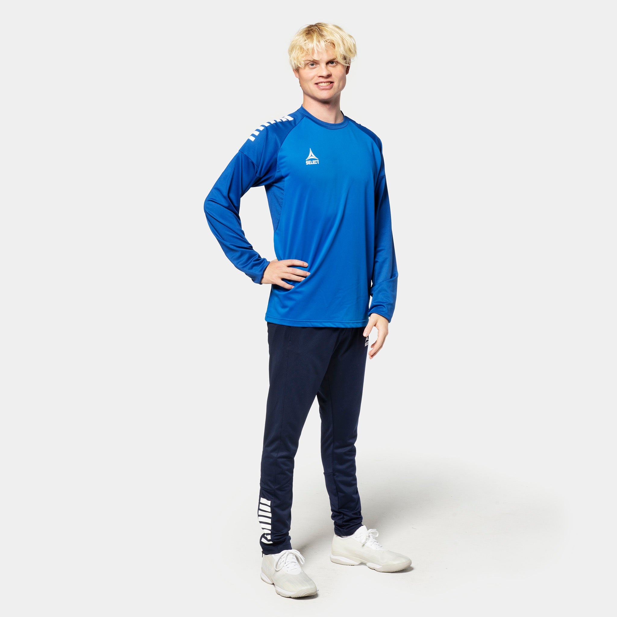 Male football player in blue Training sweat Spain v25, navy pants, Match & Training wear