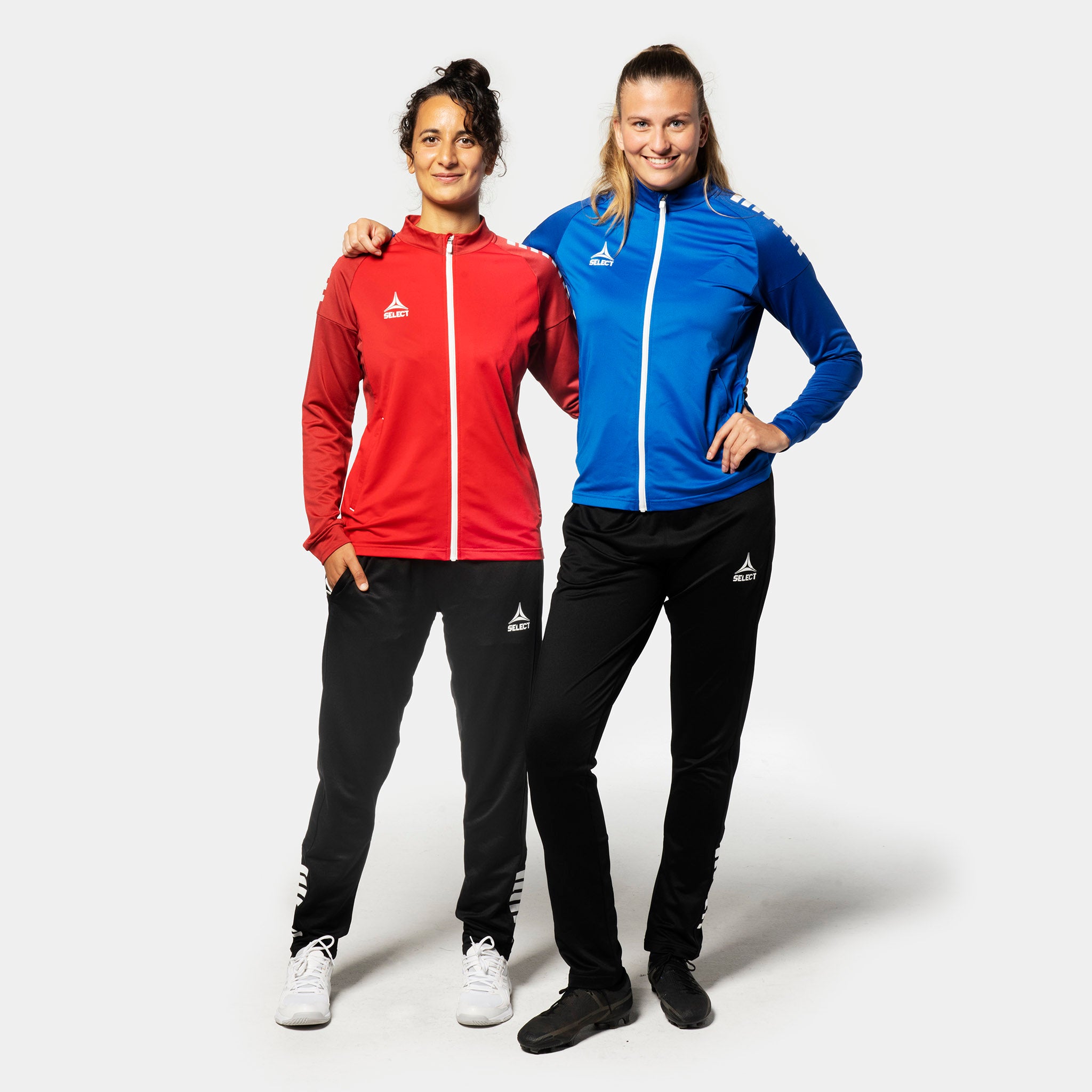 Women football players in red and blue Training zip jacket Spain woman v25 and black Training pants, Match & Training wear, front