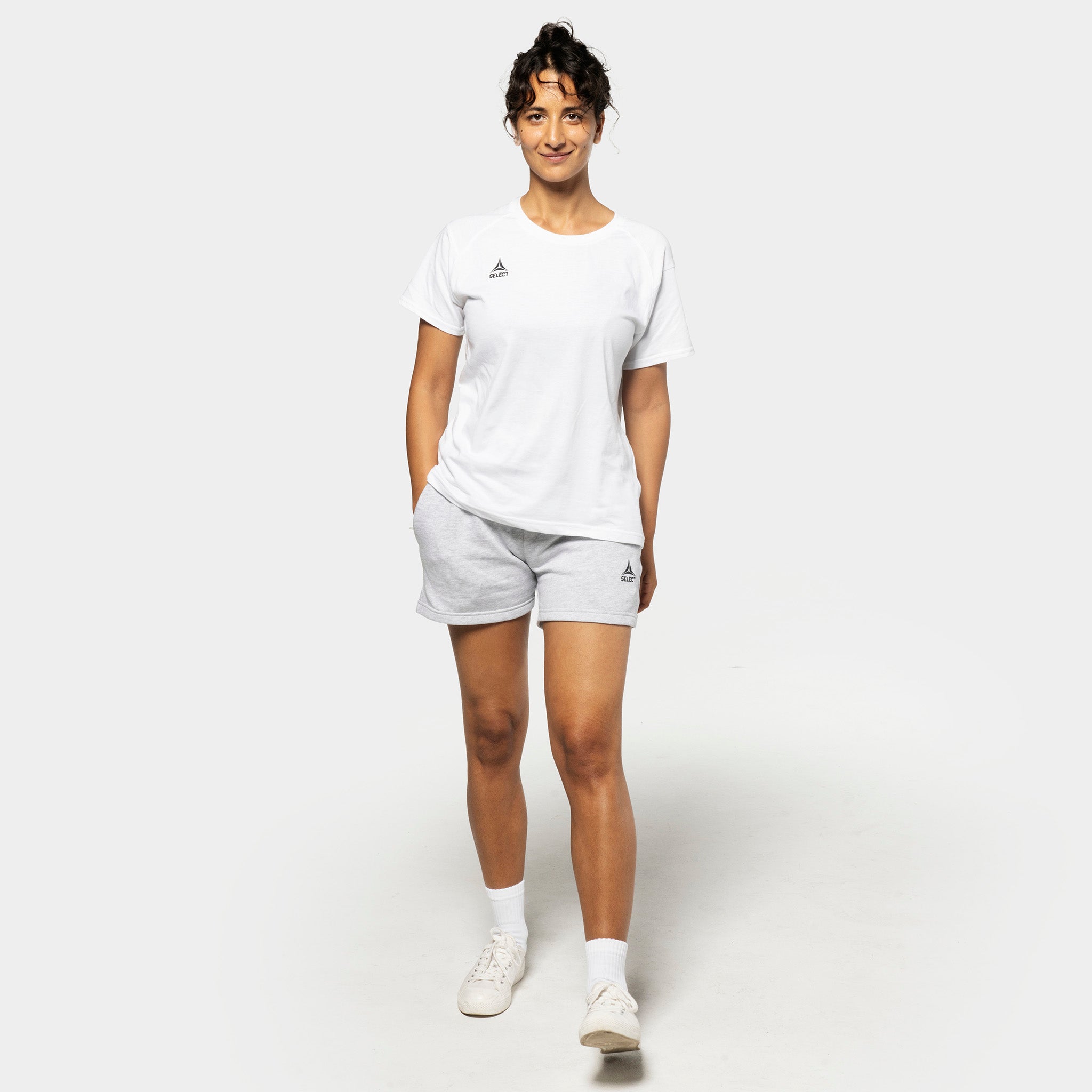 Woman football player in white t-shirt and grey Sweat shorts Oxford women v25, leisure wear, front view.