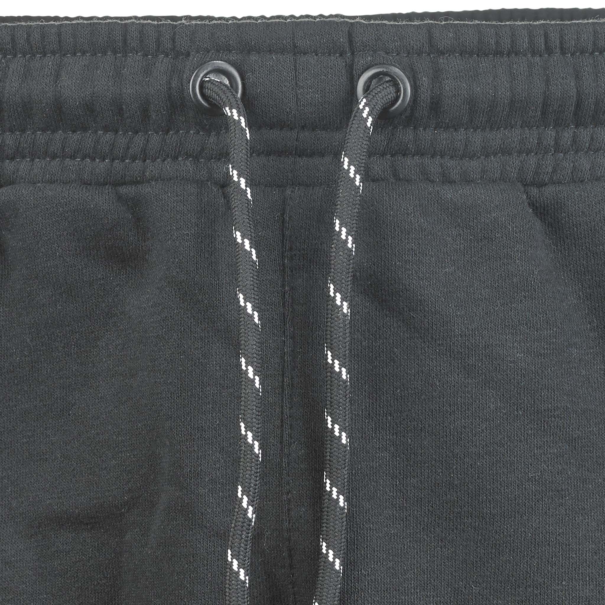 Closeup of black Sweat pants Oxford women v25 leisure wear, showing elastic waistband and black-white drawstring.