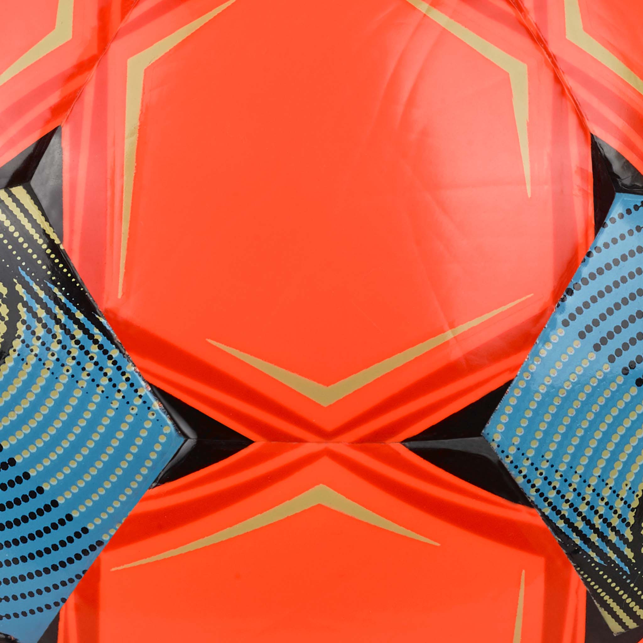 Closeup of Futsal Attack v26 football showing red, blue, gold and black panel design with geometric patterns.