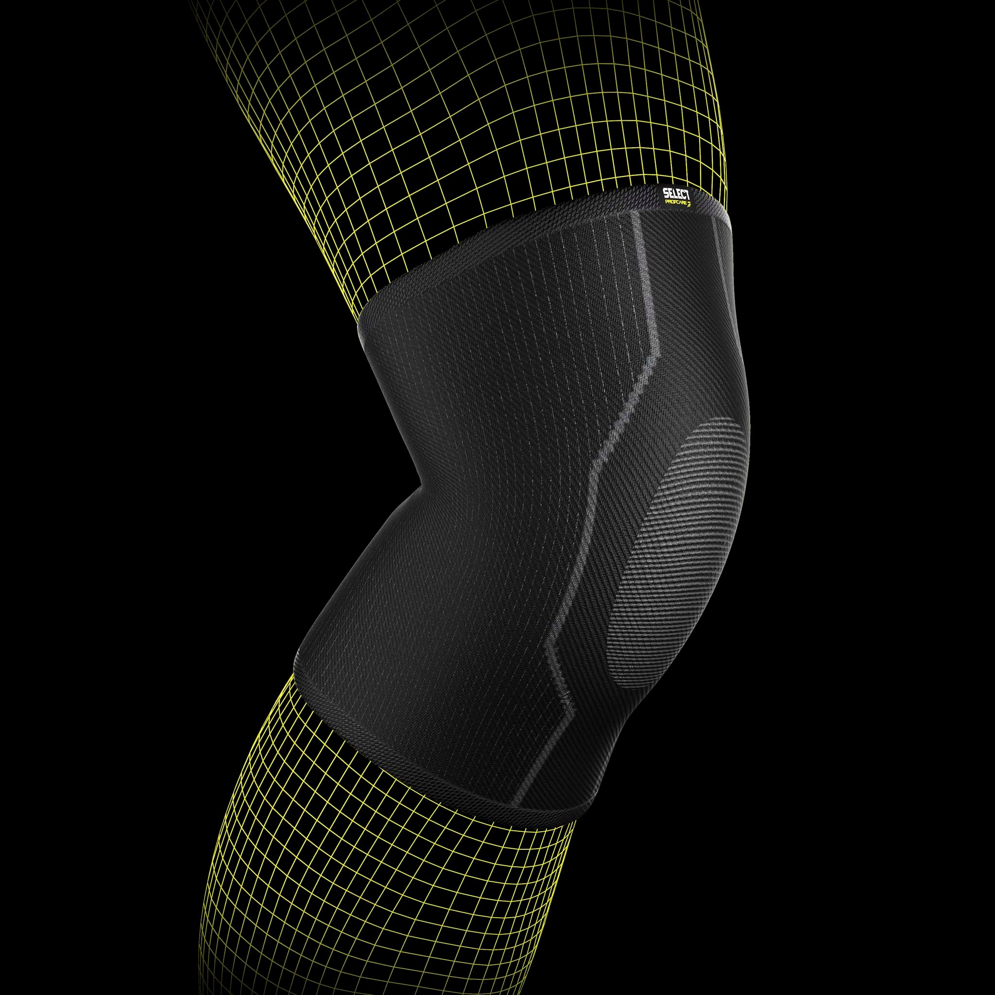 Black elastic Knee support, sports support, worn by a football player on the leg.