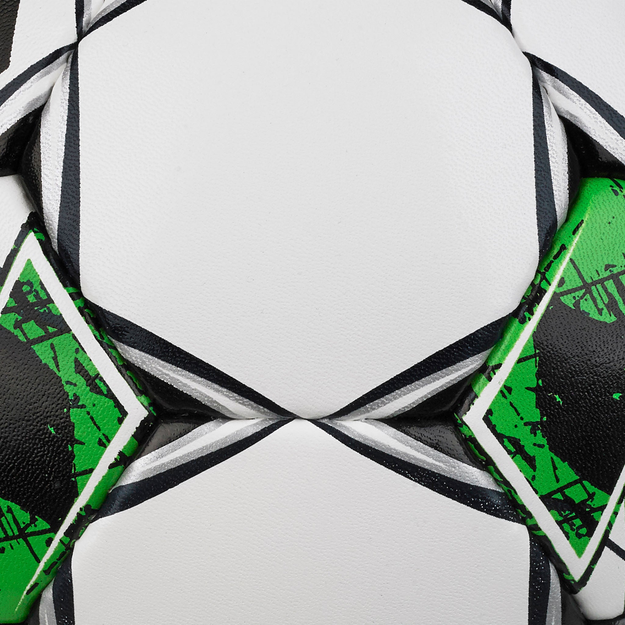 Closeup of Planet v23 football showing white panels with black and green graphic detailing.