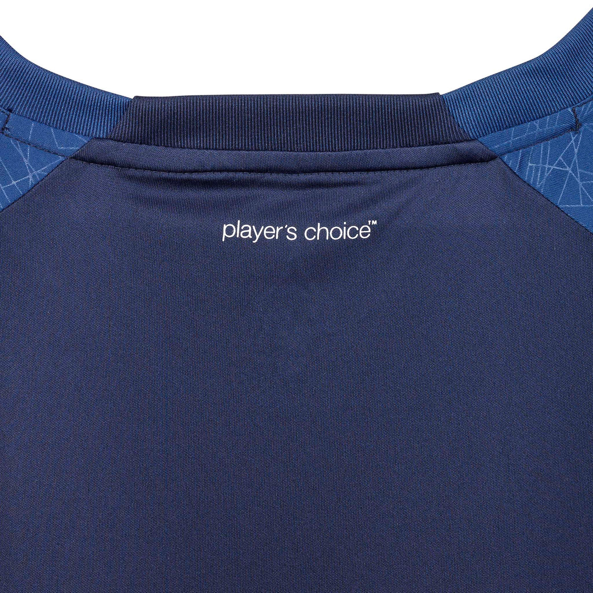 Closeup of navy Player shirt S/S Spain woman v25, Match & Training wear, white "player's choice" logo on back collar