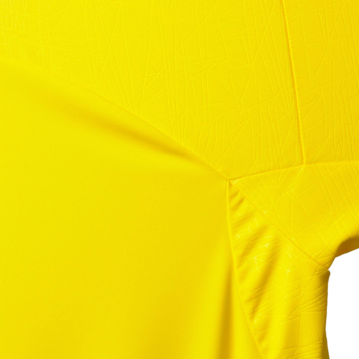Closeup of yellow Player shirt S/S Spain woman v25, Match & Training football wear, showing fabric and stitching detail.